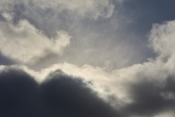 Naklejka na ściany i meble Dramatic thunderstorm clouds background at dark sky
