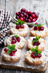 Crumble  topped fruit pies on wooden table. Christmas dessert.