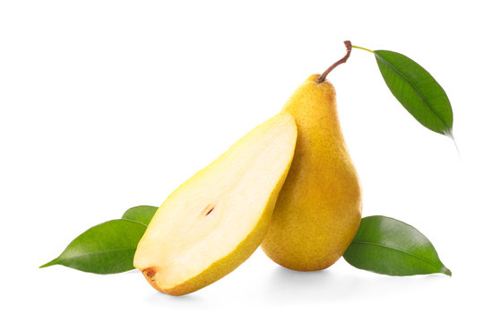 Yummy fresh ripe pear with slice on white background