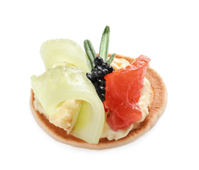 Delicious canape with black caviar on white background