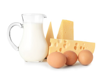 Dairy products and eggs on white background