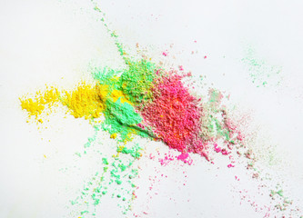 Colorful powders for Holi festival on white background