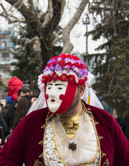 Obraz premium NAOUSSA, GREECE - FEBRUARY 18, 2018: The ancient custom of Genitsari and Boules. A dance-event taking place every year at the town of Naoussa, in Northern Greece, during the period of the carnival.
