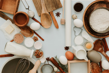 Baking or cooking background. Ingredients, kitchen items for baking cakes. Kitchen utensils, flat lay on pastel background