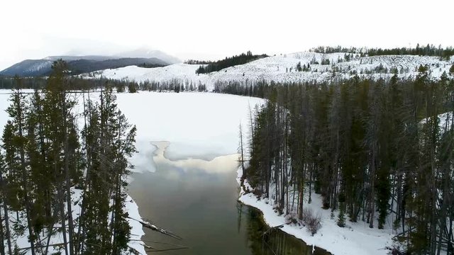 Aerial view of Little Redfish lake in winter while covered with ice