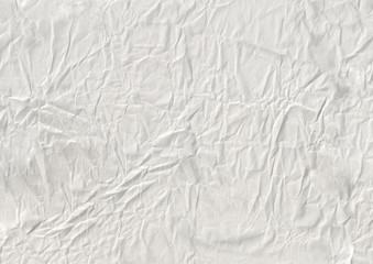 texture of white crumpled kraft paper sheet with small soft brown grain dust