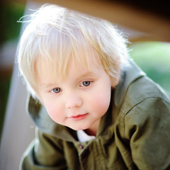 Portrait of cute little boy on playground