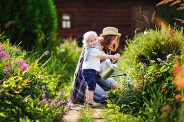 Cute toddler boy and his mat summer sunny day