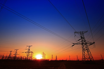 Fototapeta premium Sunset silhouette of pylon