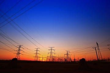 Sunset silhouette of pylon