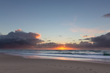 Vibrant beach sunrise