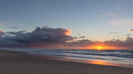Vibrant beach sunrise