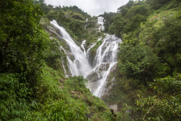 Fototapeta na wymiar Pitugro Waterfall(Petro Lo Su) or Heart Waterfall,the highest waterfall in Thailand,located in Umphang Wildlife Sanctuary,Tak Province.