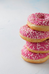 Donut. Sweet icing sugar food. Dessert colorful snack. Glazed sprinkles. Treat from delicious pastry breakfast. Bakery cake. Doughnut with frosting. Baked unhealthy round