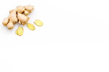 Fresh ginger root on white background top view copy space