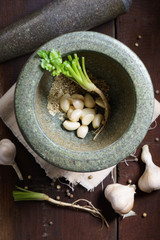 Fototapeta premium asian herbs and black mortar