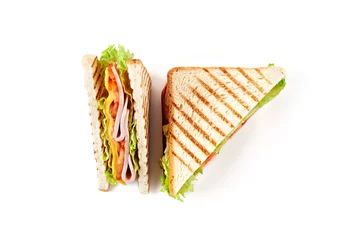 Fotobehang Sandwich met ham, kaas, tomaten, sla en geroosterd brood. Bovenaanzicht geïsoleerd op een witte achtergrond. © dizelen