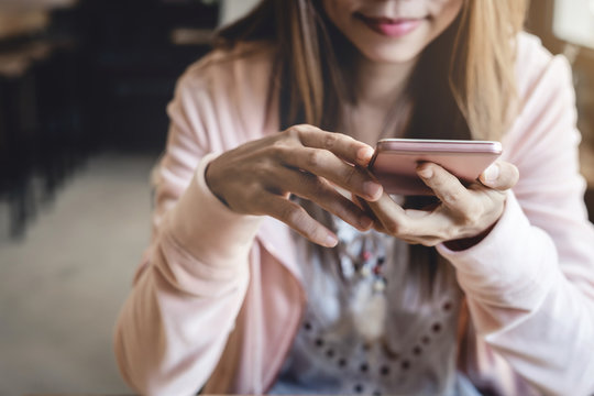 Young woman using smart phone