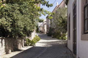 Fototapeta na wymiar View of historical, old street in old town of Cunda (Alibey) isl