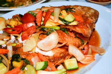 sea fried fish with vegetables