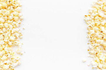 Popcorn background on white top view copy space