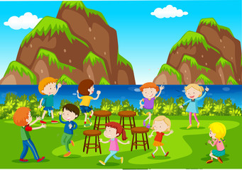 Background scene with kids playing music chairs