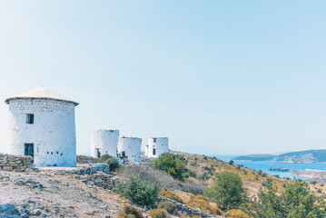 Fototapeta na wymiar Traditional restored windmills on top of Bodrum