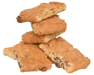 Appetizing chip cookies with raisins and candied fruit tower isolated