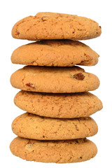 Appetizing chip cookies with raisins and candied fruit tower isolated