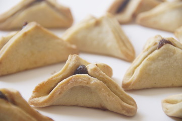 traditional purim triangular pastry stuffed with figs