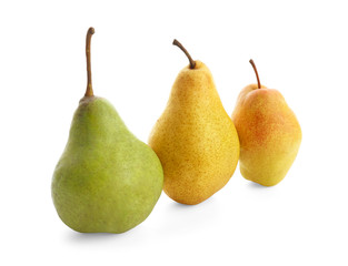 Delicious ripe pears on white background