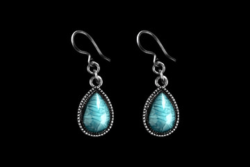 Fototapeta na wymiar Turquoise earrings isolated