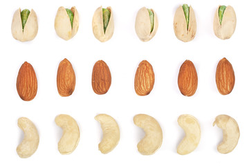 Mix nuts almonds, cashews pistachios isolated on white background. Top view. Flat lay