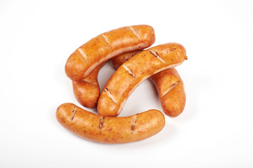 Grilled sausages isolated on a white background