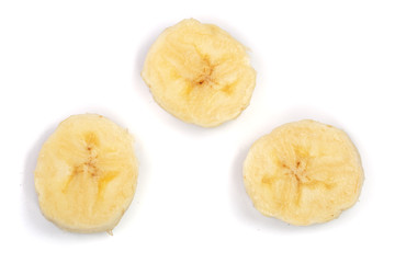 Banana slices isolated on a white background. Flat lay, top view