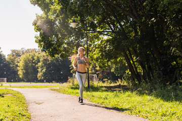healthy lifestyle young fitness woman running outdoors