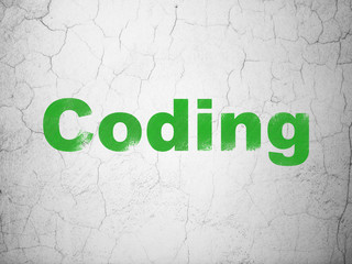 Programming concept: Green Coding on textured concrete wall background