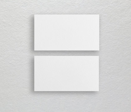 Mockup of white business cards at beige background