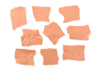 Orange paper scraps, set and collection, isolated on white background, top view