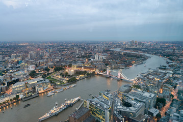 Fototapeta na wymiar Aerial view of London Tower Bridge and skyline at night, London