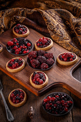 Delicious berry fruits mini tarts