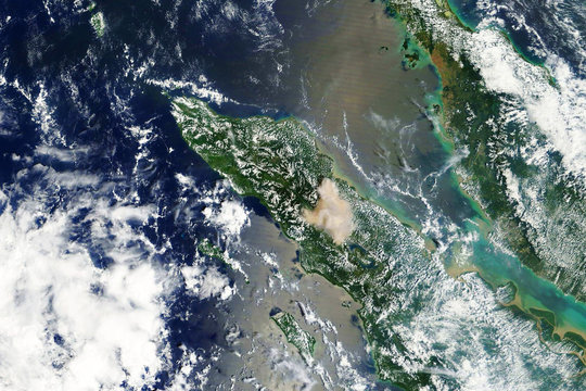 Mount Sinabung volcano eruption on Sumatra, Indonesia seen from space - Modified elements of this image furnished by NASA