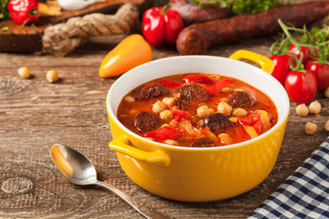 Traditional chickpea soup with paprika and chorizo sausage.