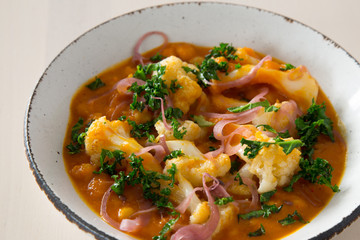 Pumkin Curry topped with  Cauliflower & Kale