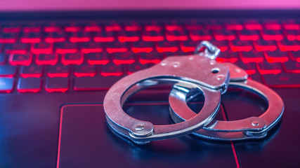 Handcuffs with the laptop