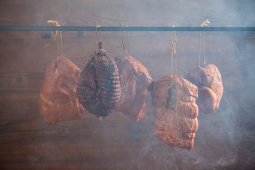 Smoked pork in a homemade smokehouse