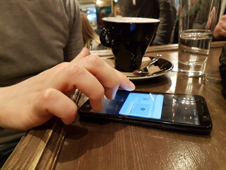 coffee mobile phone in a cafe bar leisure time