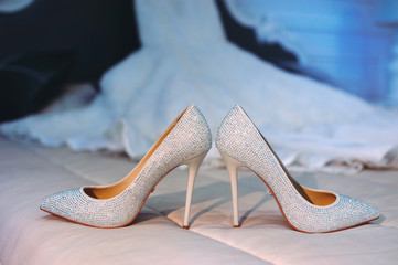 Elegant white bride shoes. Wedding accessories. Preparations