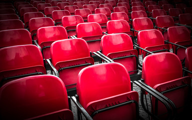 Red seats into the outdoor theatre