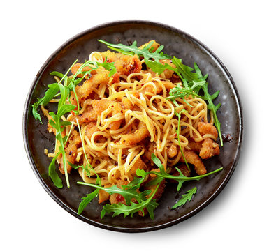 Plate of asian noodles with fried meat